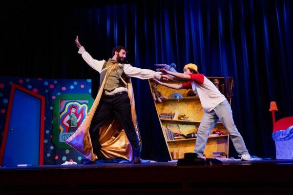 a man and woman performing on a stage