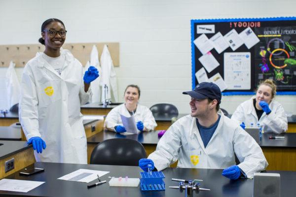 a few people in lab coats